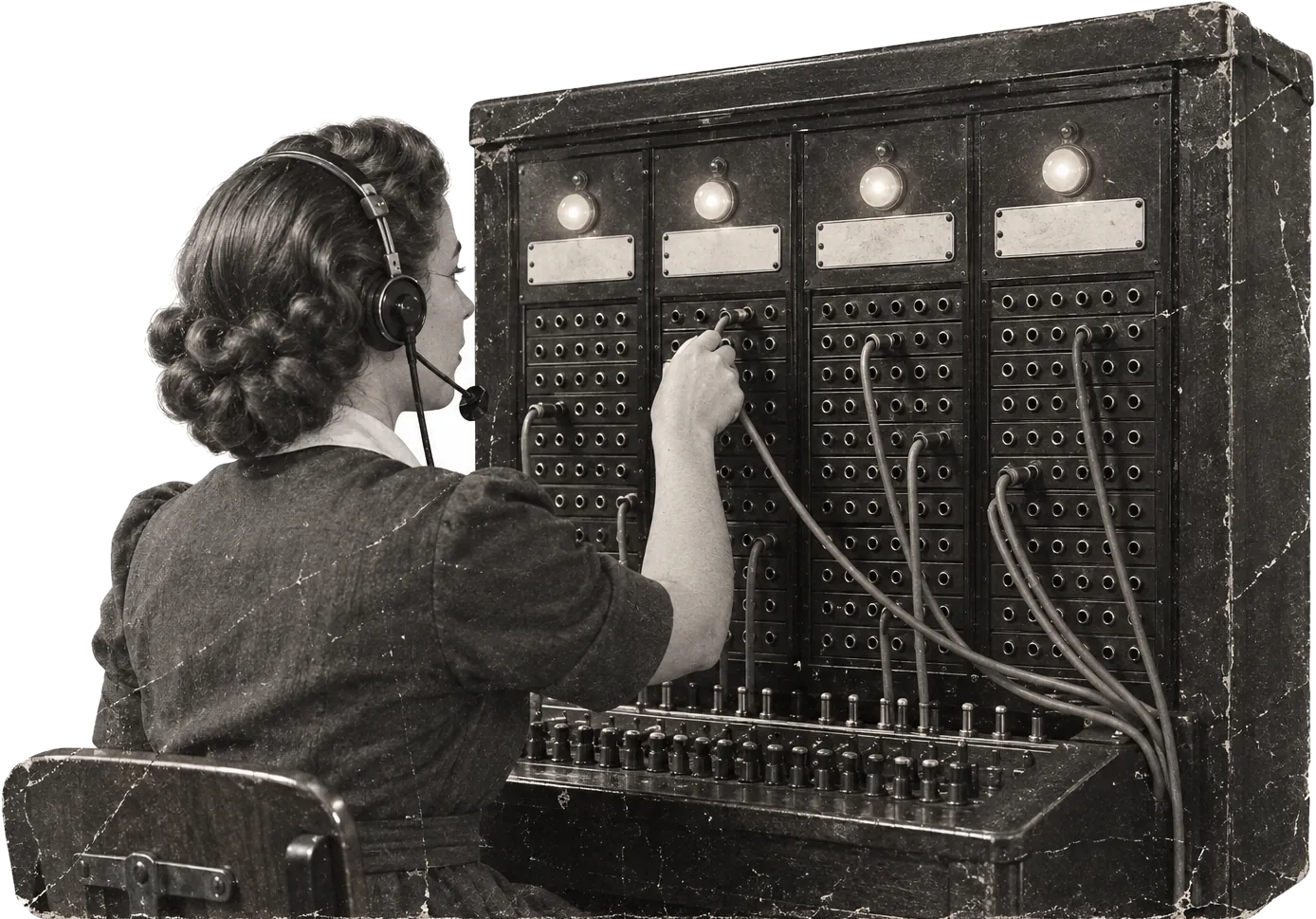 A period-style photograph of a switchboard operator in a headset plugging a cord into a board of four panels, a lamp lit over each panel.